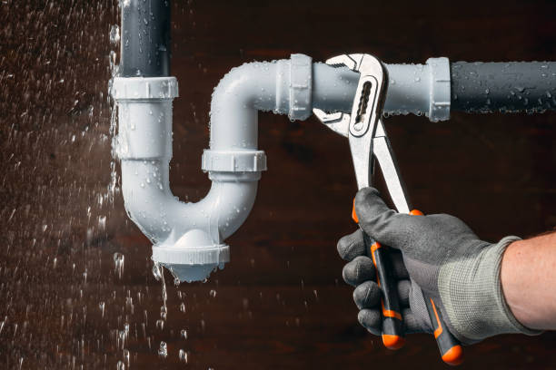 Professional Water Heater Repair technician working in Island Park, NY